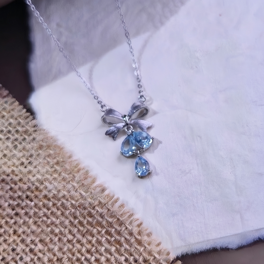Blue Topaz Drop Necklace with Bow (925 Sterling Silver)
